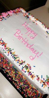 Small rectangle ice cream cake. Yellow cake, French vanilla ice cream, and sprinkles