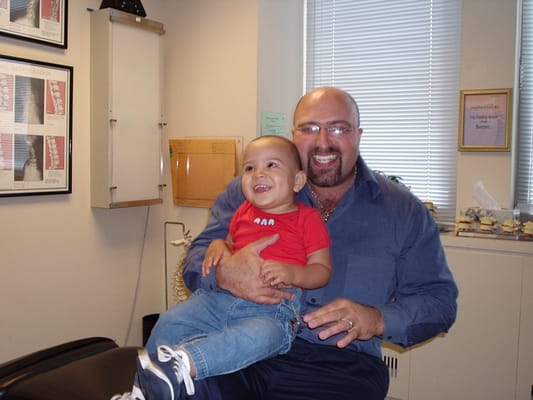 Dr. Ward with a young patient