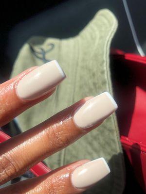 The outcome of my nails. I chose a white line, and he found the tan color.