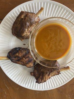 Pig wings with yummy mustard sauce. Meat just falls off the bone.