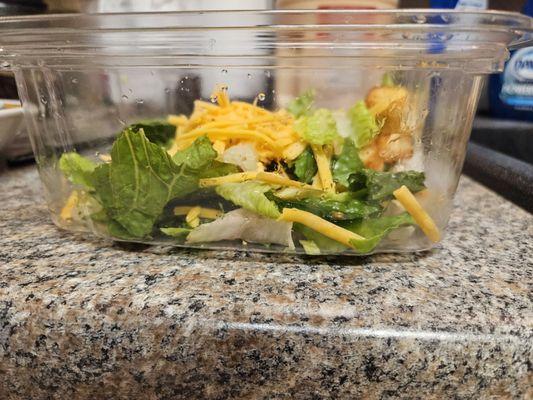 This is what's left after the toppings were removed. ONE person could have eaten this family salad! Shame on you, Marco's!!