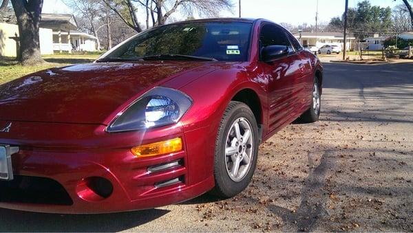 Quarter panel and front headlight damage repaired by Alex paint and body