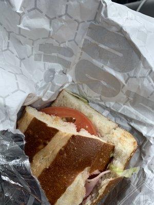 Italian sub on pretzel bun