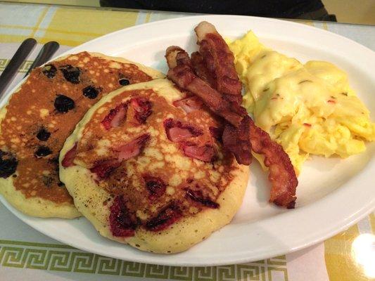 Pancake special: 1 each of blueberry and strawberry pancakes, side of bacon and eggs.