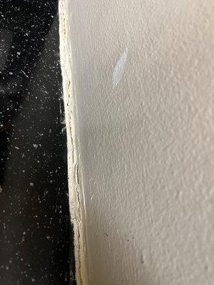 The cracks in my apartment that need to be sealed up.