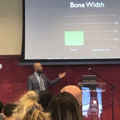 Dr. Bak, lecturing students at USC School of Dentistry