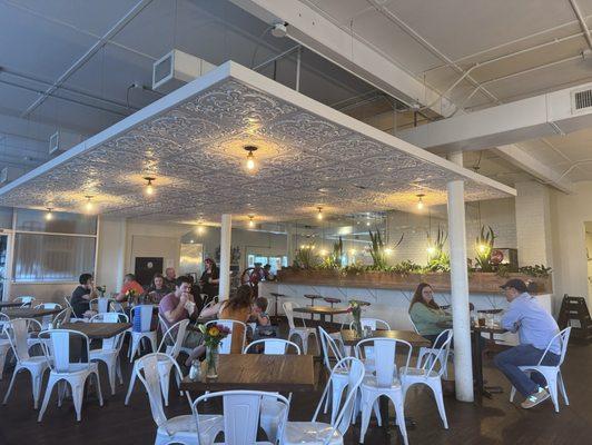 Dropped ceiling gave the dining area a more intimate feel.