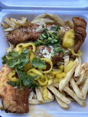 Fried cod w cilantro fresh garlic and banana peppers. Fresh cut fries. AMAZINGGG!