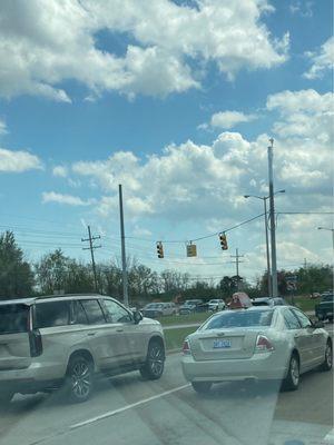 Driver about to cut off suv