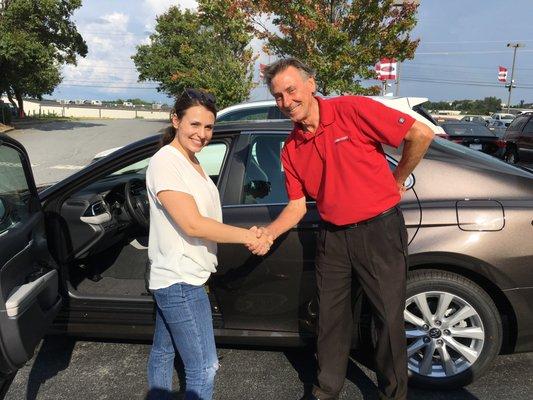 My salesman, Tim Cleary, and I after buying my first car! I love my Toyota Camry!