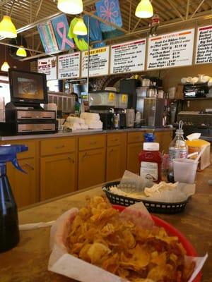 Inside of restaurant ... Pic of my Fresh cut ribbon fries and my empty Classic dog tray :)