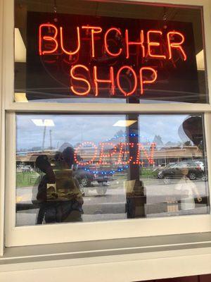 Outside of the butcher shop -- signage