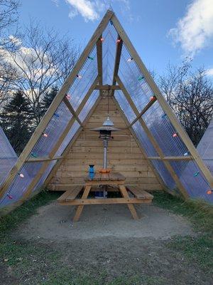 There are several of these huts with heat lamps