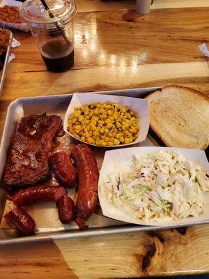 Sausage, links with cheese. Corn and Cole slaw sides