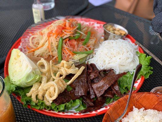 Papaya salad, beef jerky platter (Laos style)