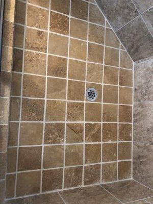 Shower floor. Sealed grout lines. Tiles were cleaned and resealed. Looks Great!