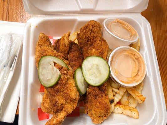 Hot tenders combo with a side of fries