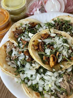 2 carnitas tacos  2 Al pastor tacos  2 asada tacos