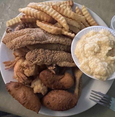 Fried catfish, fried shrimp, French fries, cheese grits & hush puppies