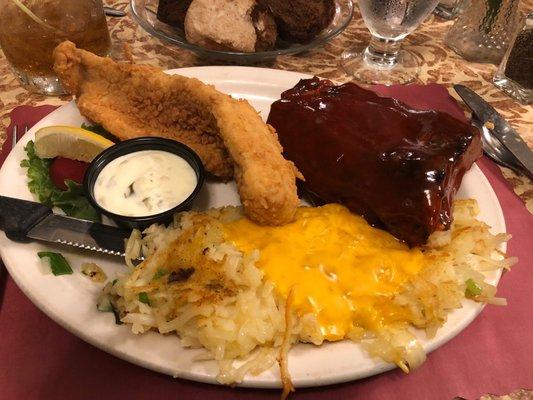 Ribs with deep fried walleye and lyonnaise potatoes.