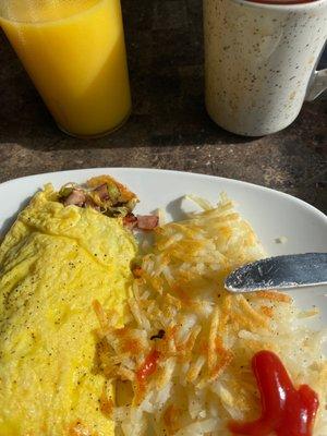 Western omelette, orange juice, and coffee