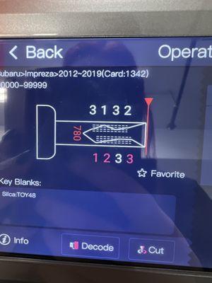 Key programming tool decoding key cuts so we can make a key for a Subaru Impreza