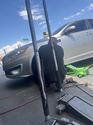 Mr. Albert fixing my tire.