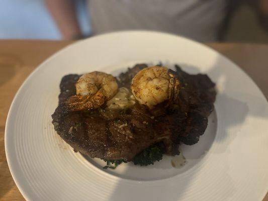 Ribeye steak with shrimp on top