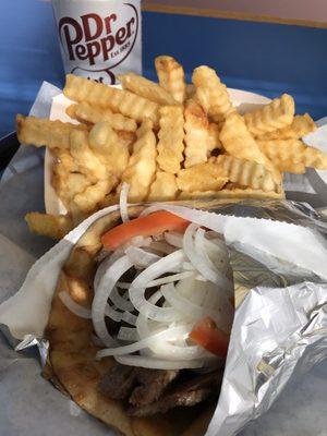 Gyros lunch combo with fries & can of soda.