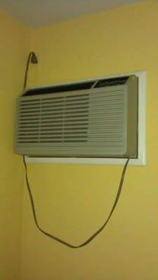 Our AC unit. Looks really classy, but at least it worked.