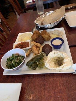 Appetizer sampler, hummus Potato Cigar, Meat Cigar, Falafel, Kibbe and other stuff (pita in the background)