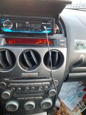 This shows the new stereo mounted while ac still working using the stock kit