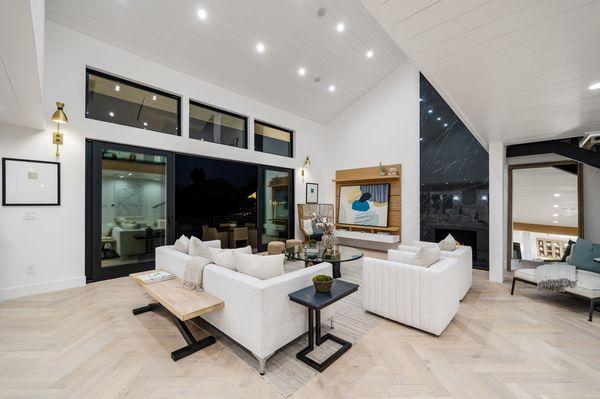 Wood floors + Porcelain slabs installed on the fireplace.