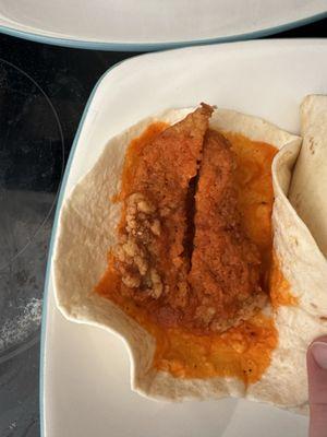 Mmmm, a buffalo chicken taco that someone decided didn't need the lettuce, cheese, and pico that it's supposed to come with.