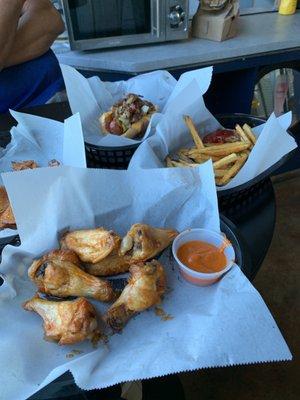 Wings, French fries and Yanni's sausages. Cooked fresh to order. Literally saw Jason cutting up the potatoes to fry.