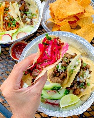 Tacos lengua, pork carnitas, carne asada