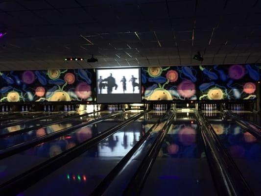 Music videos, black lights & fog machine for Saturday night glow bowling