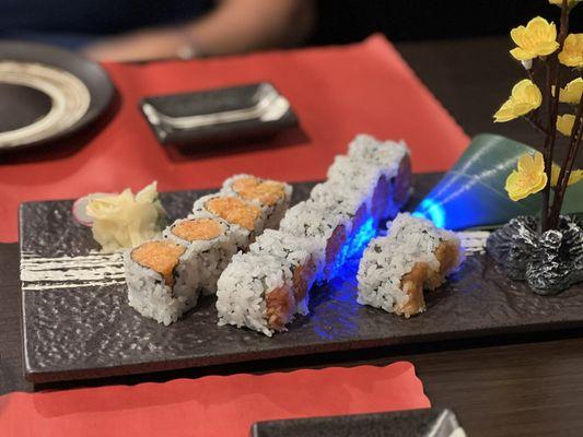 Spicy tuna and spicy salmon rolls.  With cute lights and flowers!