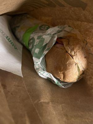 Is this how you are supposed to wrap a sandwich? Isn't it supposed to be fully in the wrapping?