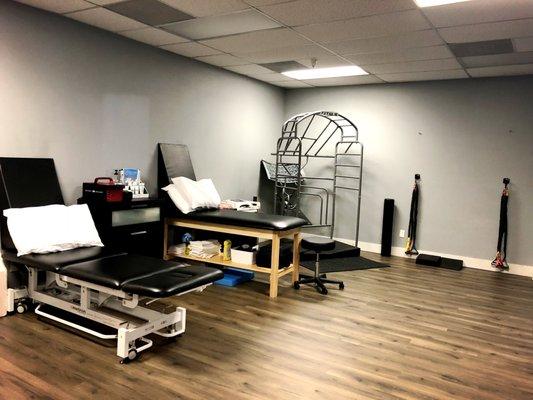 Manual therapy and treatment room equipped with Gameready, Normatek, blood flow restriction training, and more!