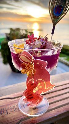 Red Dragon Fruit Lychee Strawberry Rose Water Butterfly Pea Tea.  Edible handmade rabbit candy garnishes!  Edible flowers