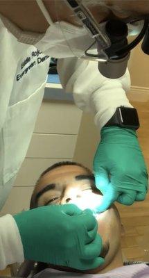 Initial dental exam being performed by Dr. Eduardo R. Rojo, DDS.