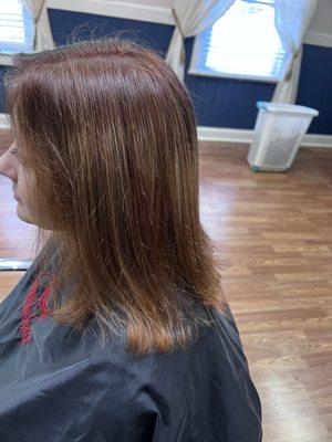 We cover up old blonde hair with a touch of cooper/red tones