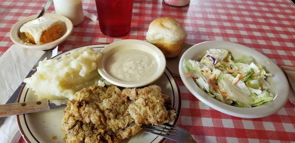 Chicken Fried Steak, mashed potatos, gravy, salad, roll, and orange creamsicle cake.