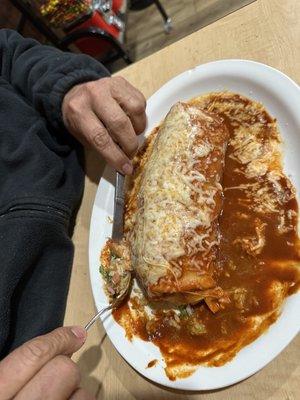 A wet Burrito in red sauce