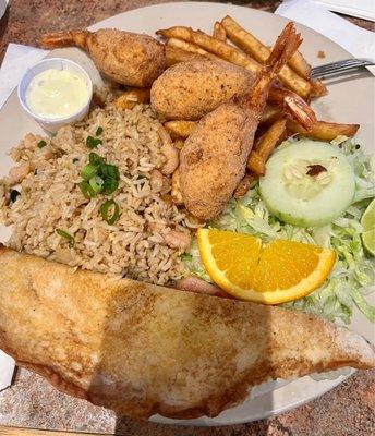 Stuffed shrimp with shrimp fried rice, fries and salad.