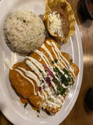 Chicken enchiladas with cilantro lime rice and beans. Very tasty.