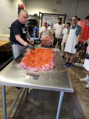 Blending seasoning into ground pork