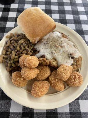 Chicken fried steak  Purple hull peas Corn fritters  Hot roll