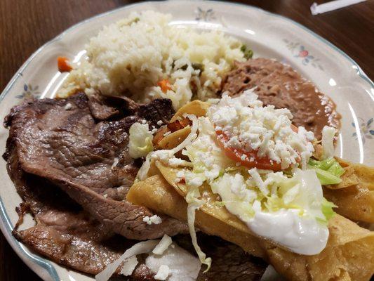 Steak and two flautas combination